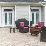 Flagstone vs. Stamped Concrete Patios in North Texas: Which Is Right for Your Backyard? flagstone vs stamped concrete patio north texas gainesville tx